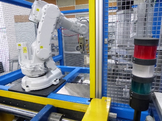 Robot de fonderie coquille
